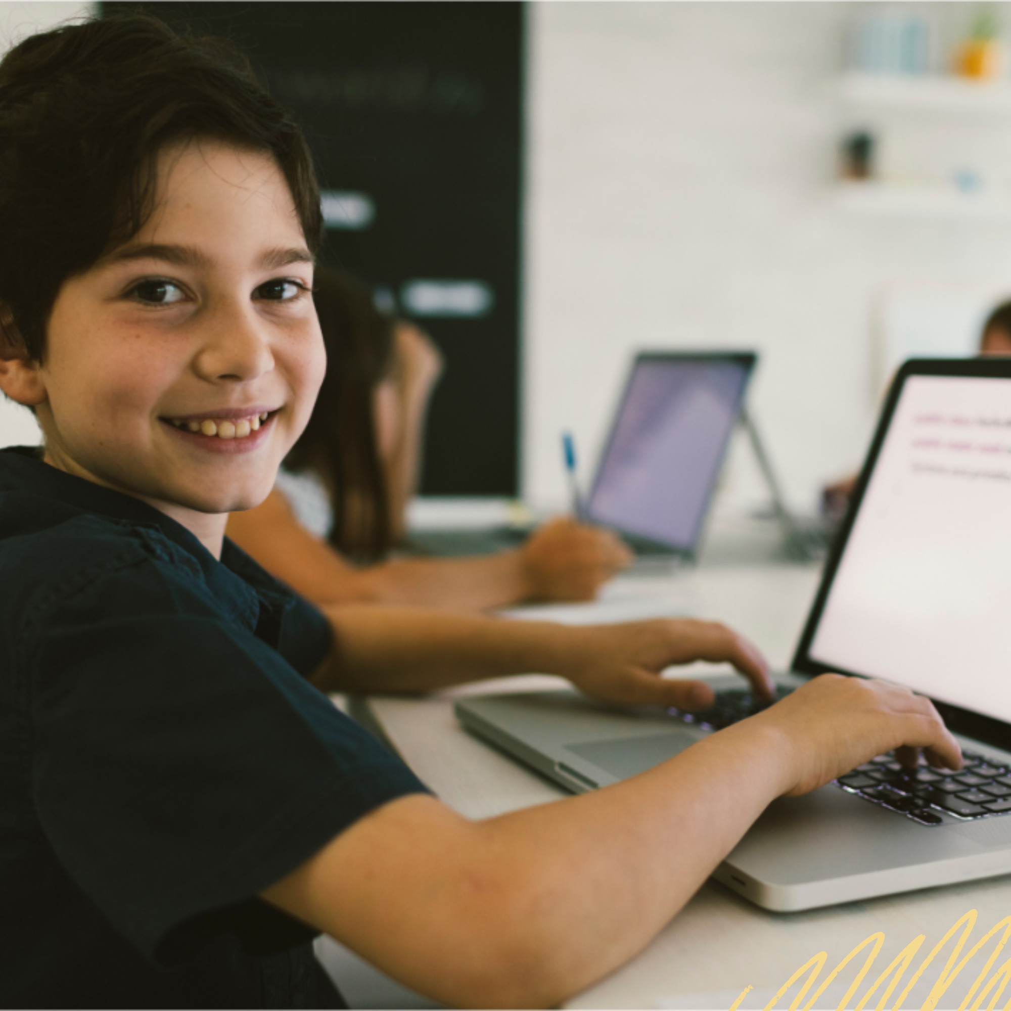 Elementary aged student using AI on a computer