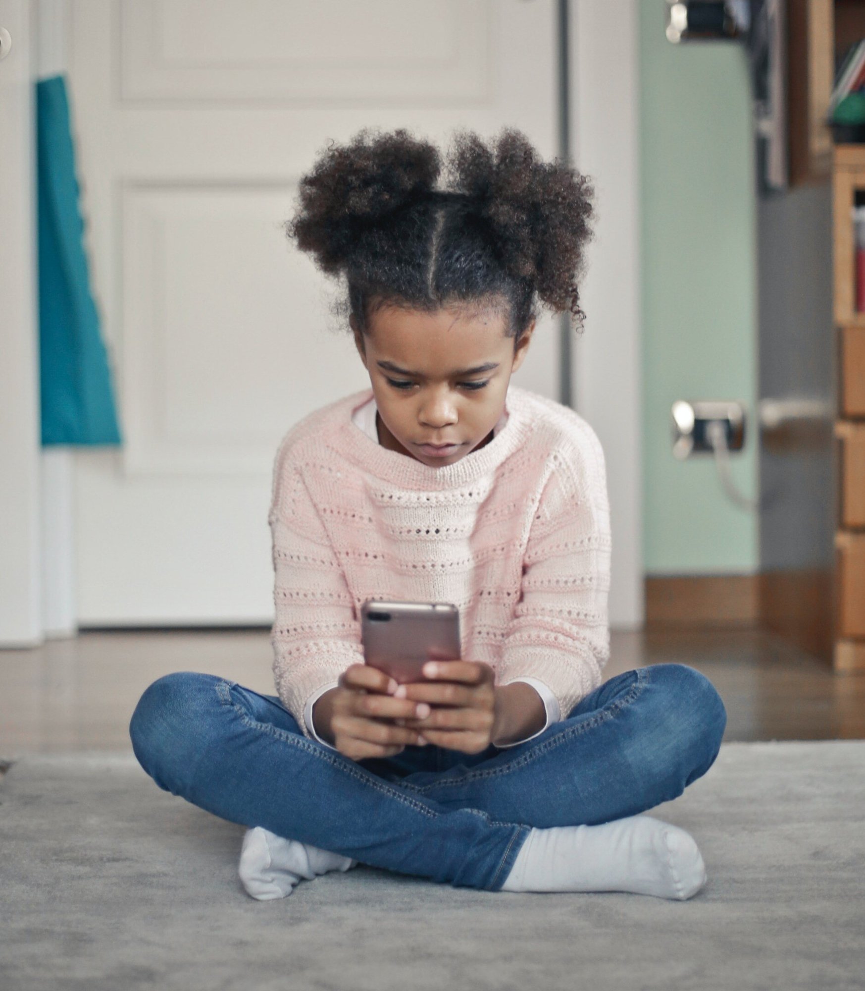 Child looking at a digital device